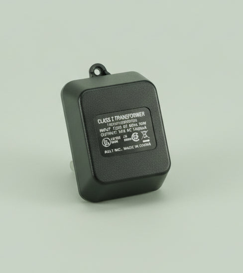 Black transformer with label on a white background