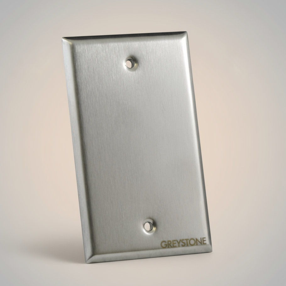 Metallic wall plate with 'Greystone' branding on a light gray background