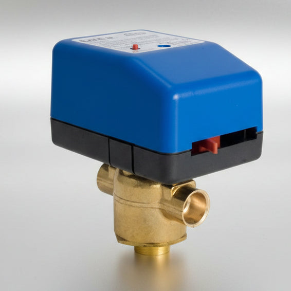 Blue and black electrical valve actuator with brass valve on a white background