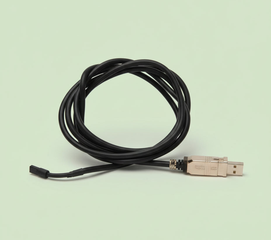 Black cable with a plug on a white background