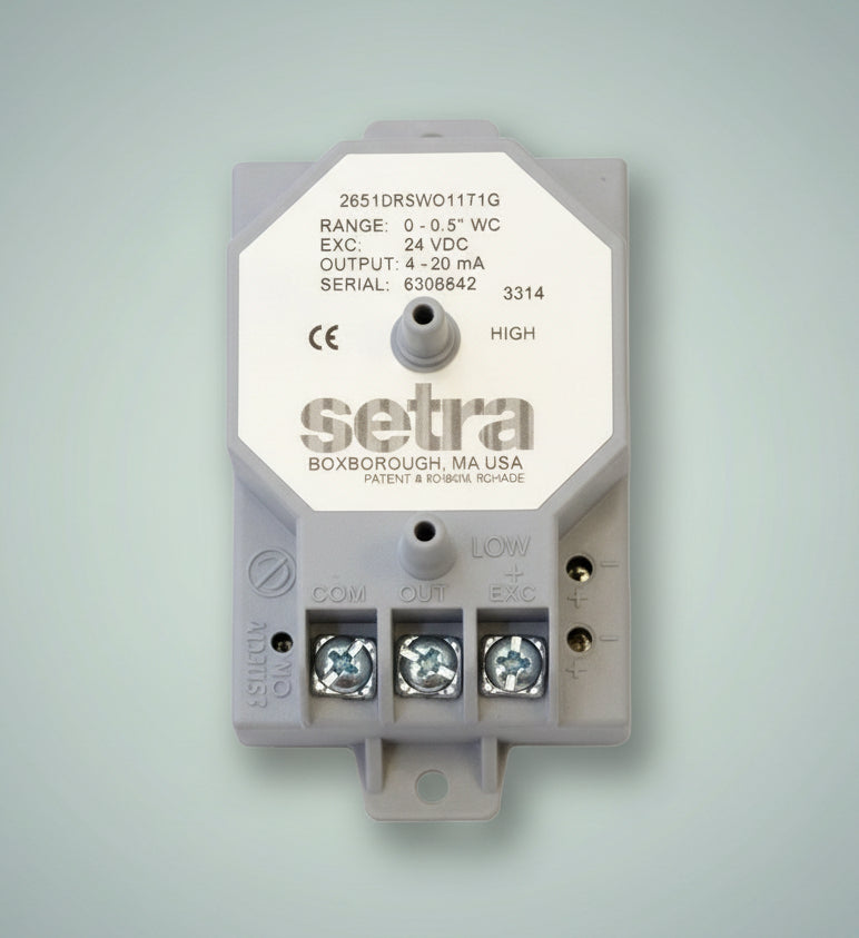 Setra electronic device with characteristics labeled on a light pale blue background