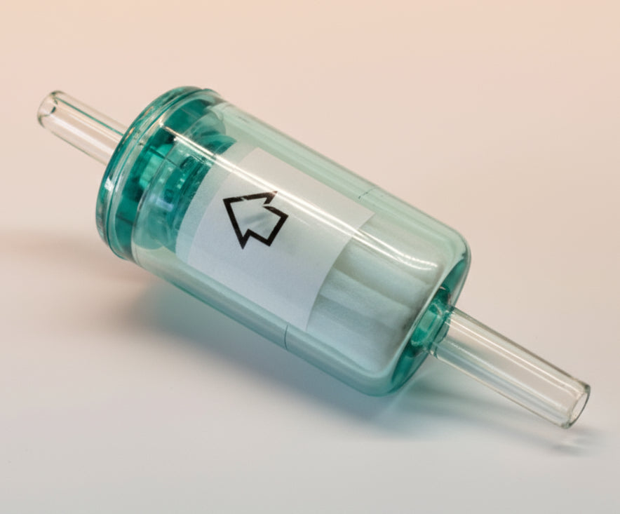 Turquoise glass filter with a black arrow symbol on a white background