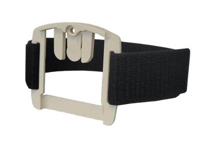 Black strap with beige plastic buckle on a white background