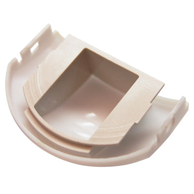 Beige plastic component on a white background