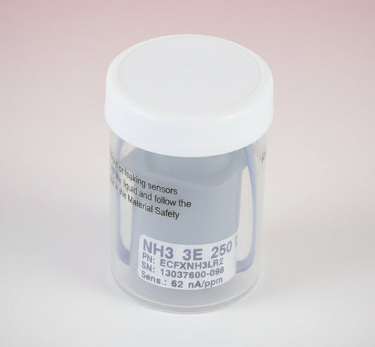 Clear container with white lid containing cylindrical ammonia sensor on a white background