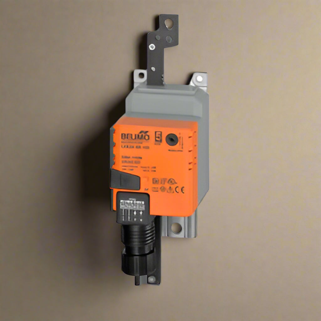 Orange and grey mechanical box on a greyish background