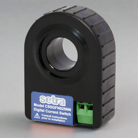 Setra-branded black plastic current switch with opening on a gray background