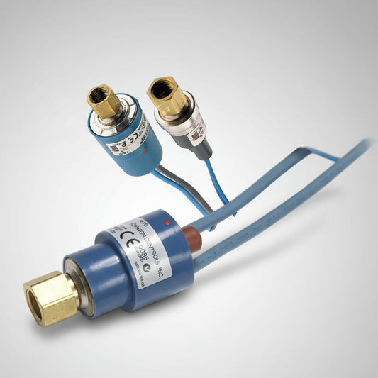 2-ended cylindrical sensor components with brass connectors and blue cables on a white background