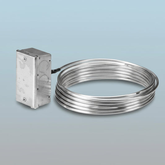 Metallic coil and rectangular block on a white background