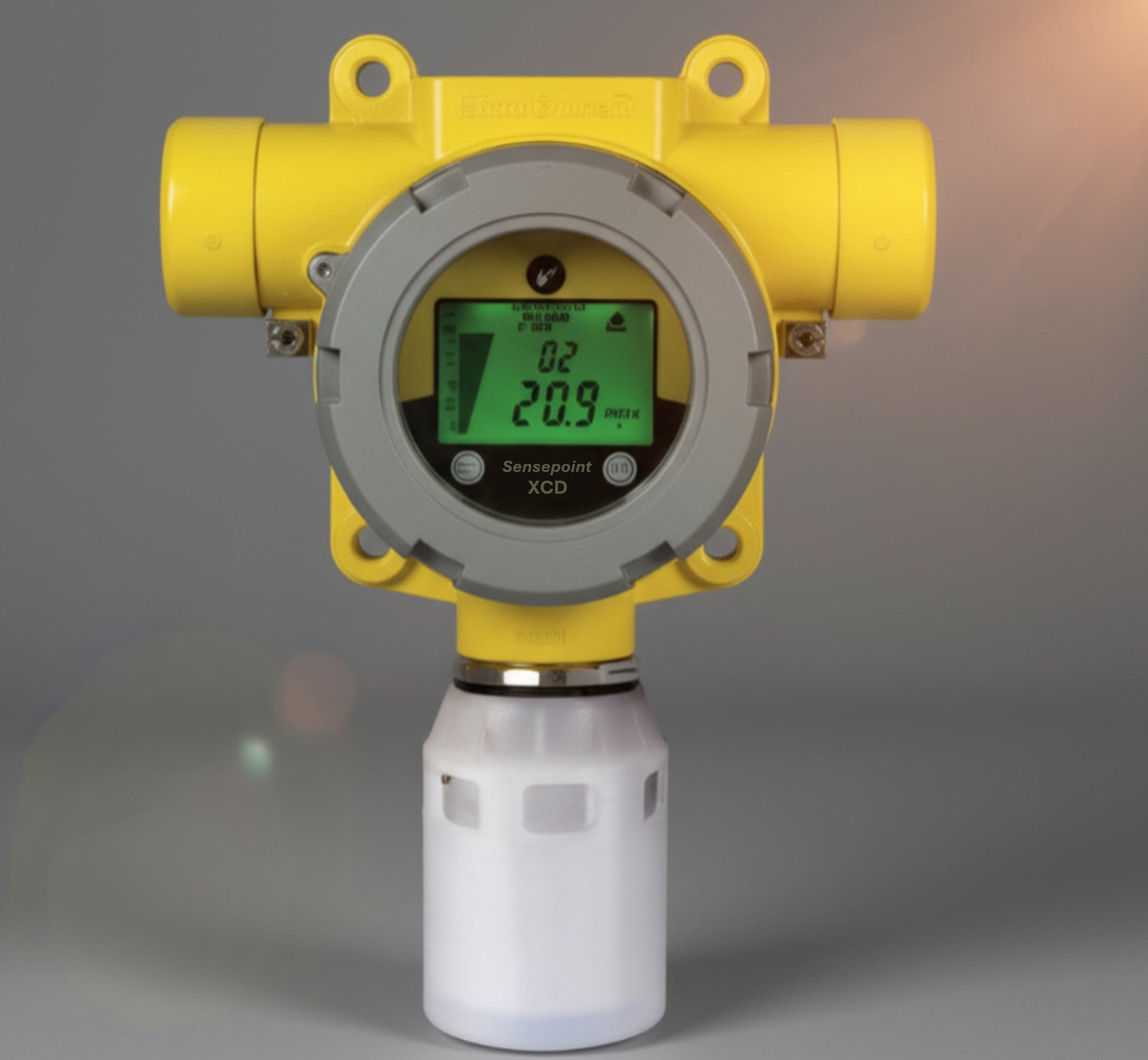 Yellow and white industrial sensor with digital display on a gray background