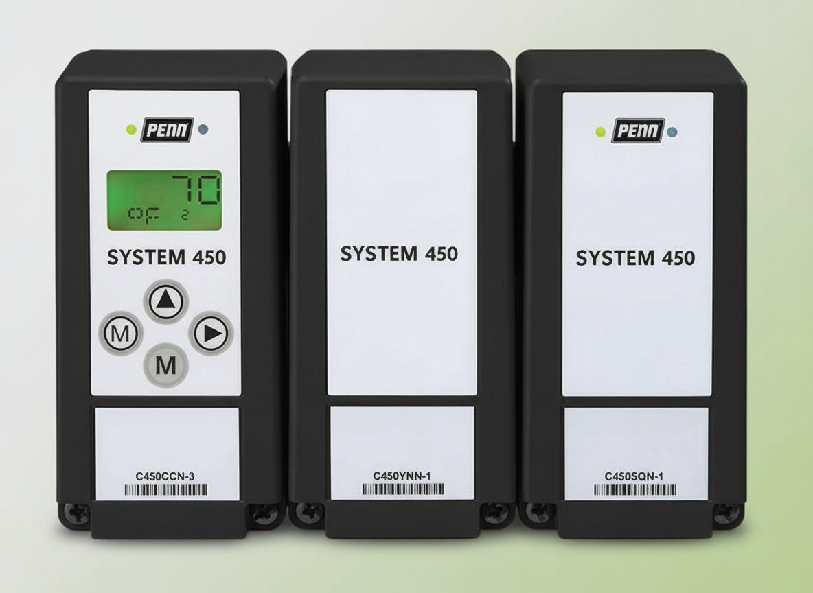 Three Penn System 450 devices on a white background