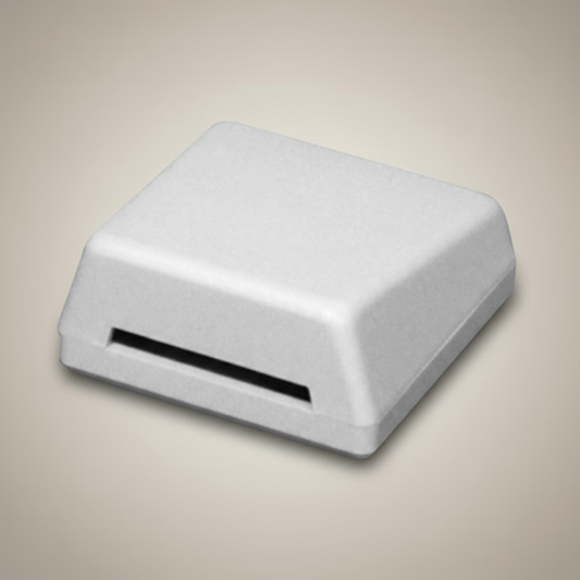 White rectangular object with a slot on a white background