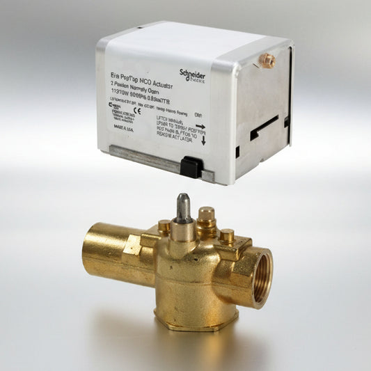 Brass valve and white rectangular box with Schneider Electric branding on a white background