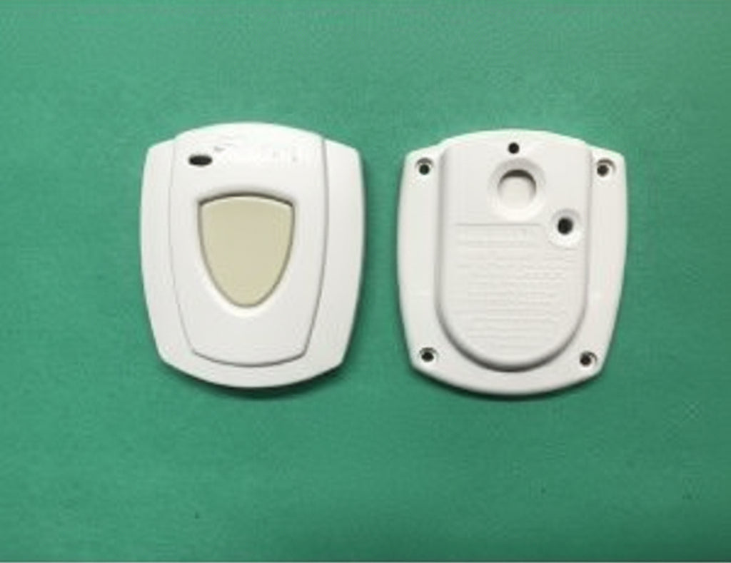 Two electronic devices on a green background with a small label in the center.