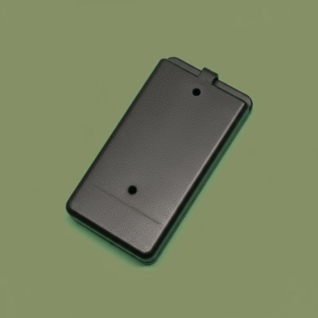 Black rectangular object on a green gradient background