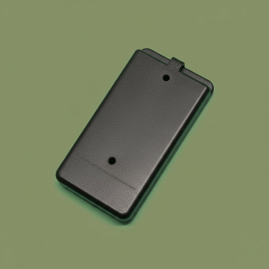 Black rectangular object on a green gradient background