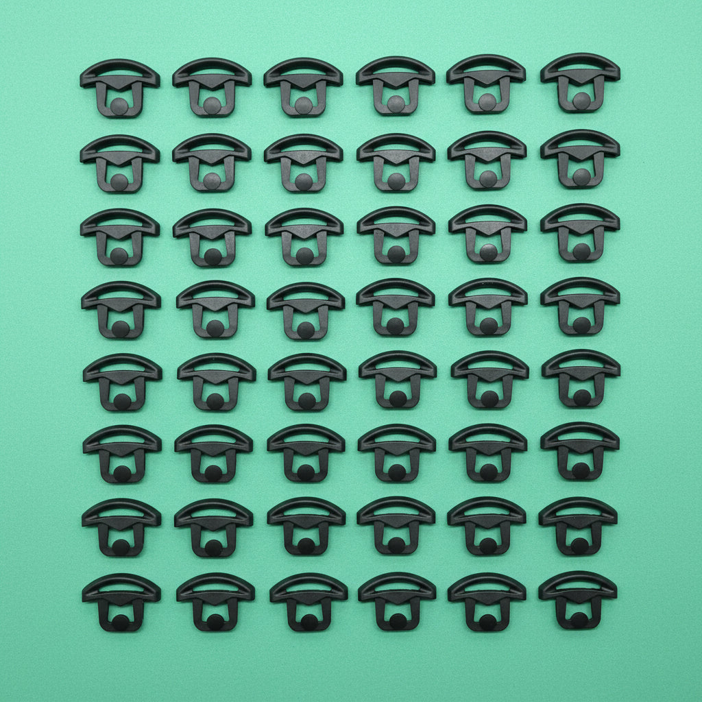 Black clips on a green background