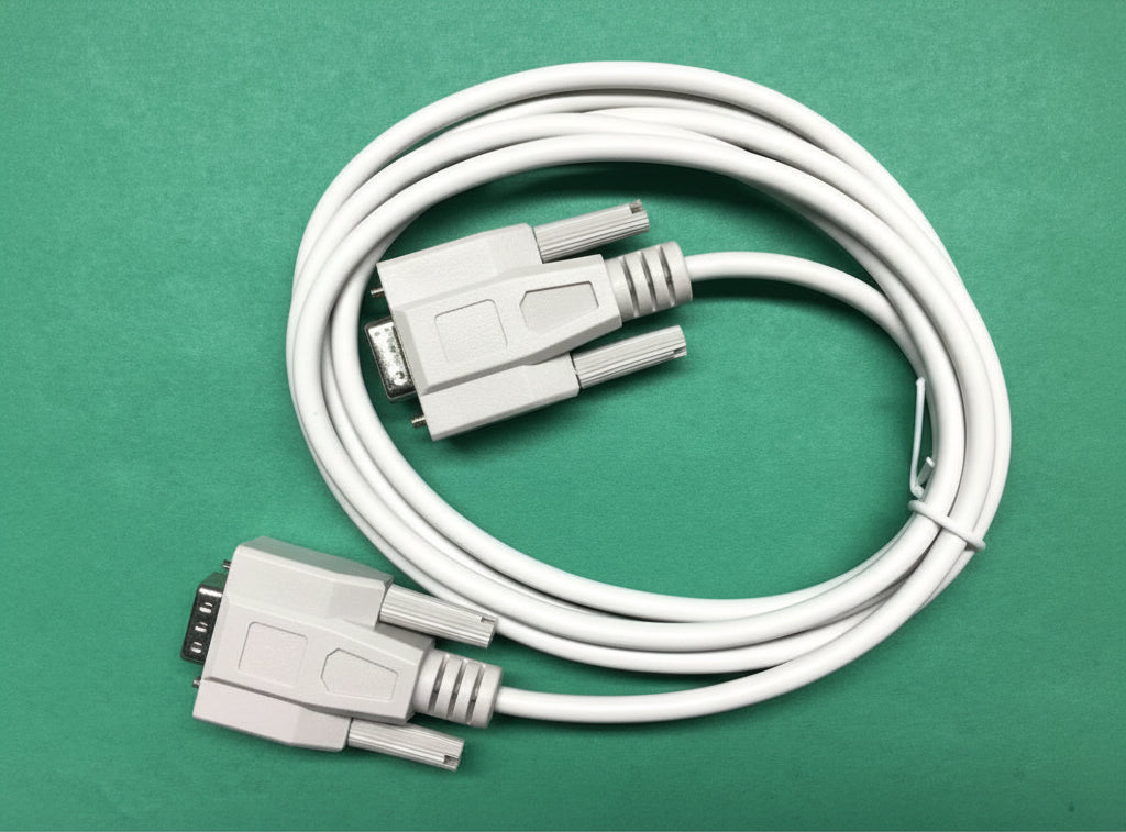 Coiled cable with connectors on a green background