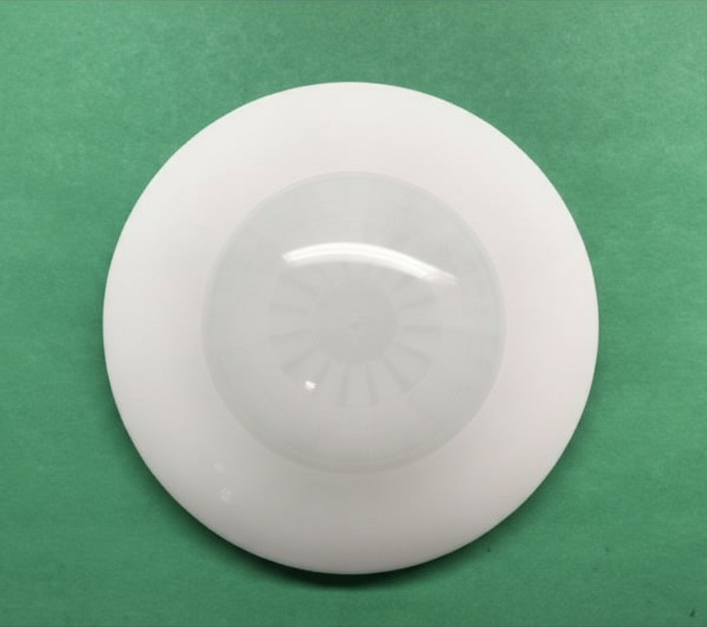 White dome-shaped object on a green background