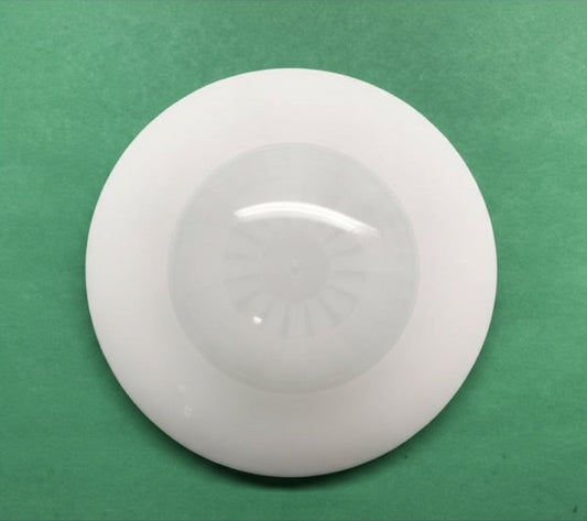 White dome-shaped object on a green background