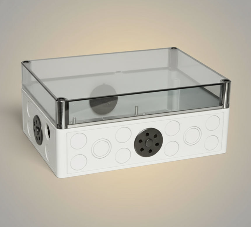 Clear plastic box with circular components on a white background