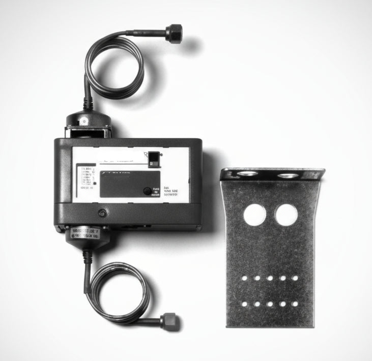 Black and white image of a mechanical device with a lever and digital display on a white background