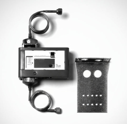 Black and white image of a mechanical device with a lever and digital display on a white background