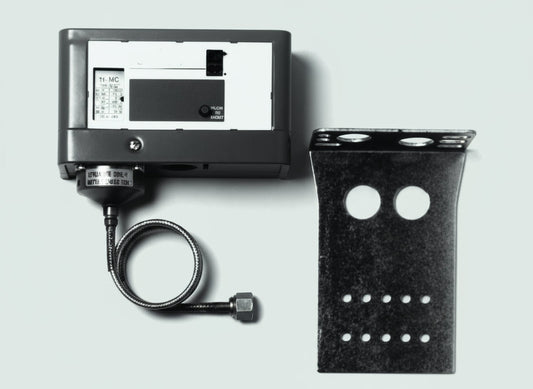 Industrial device with a mounting bracket on a white background