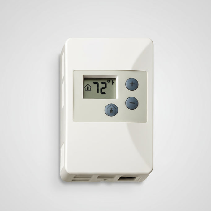 Digital thermostat on a white wall