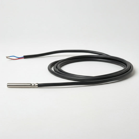 Thermocouple with black cable on a white background