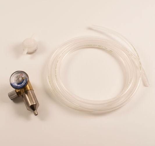 Gas regulator with hose and nozzle on a white background